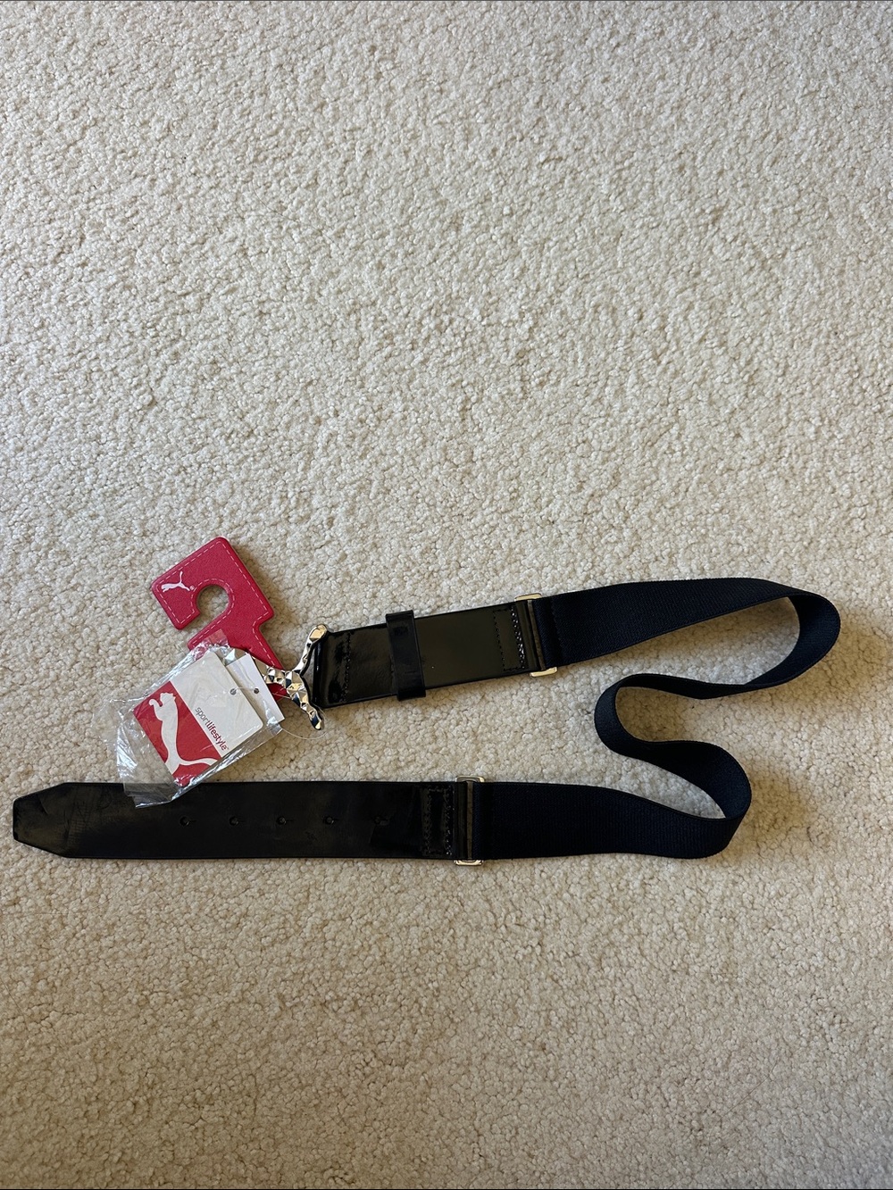 Puma Black Patent Belt with Silver Puma Emblem and Red Tag